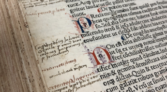 old book with writing in margins