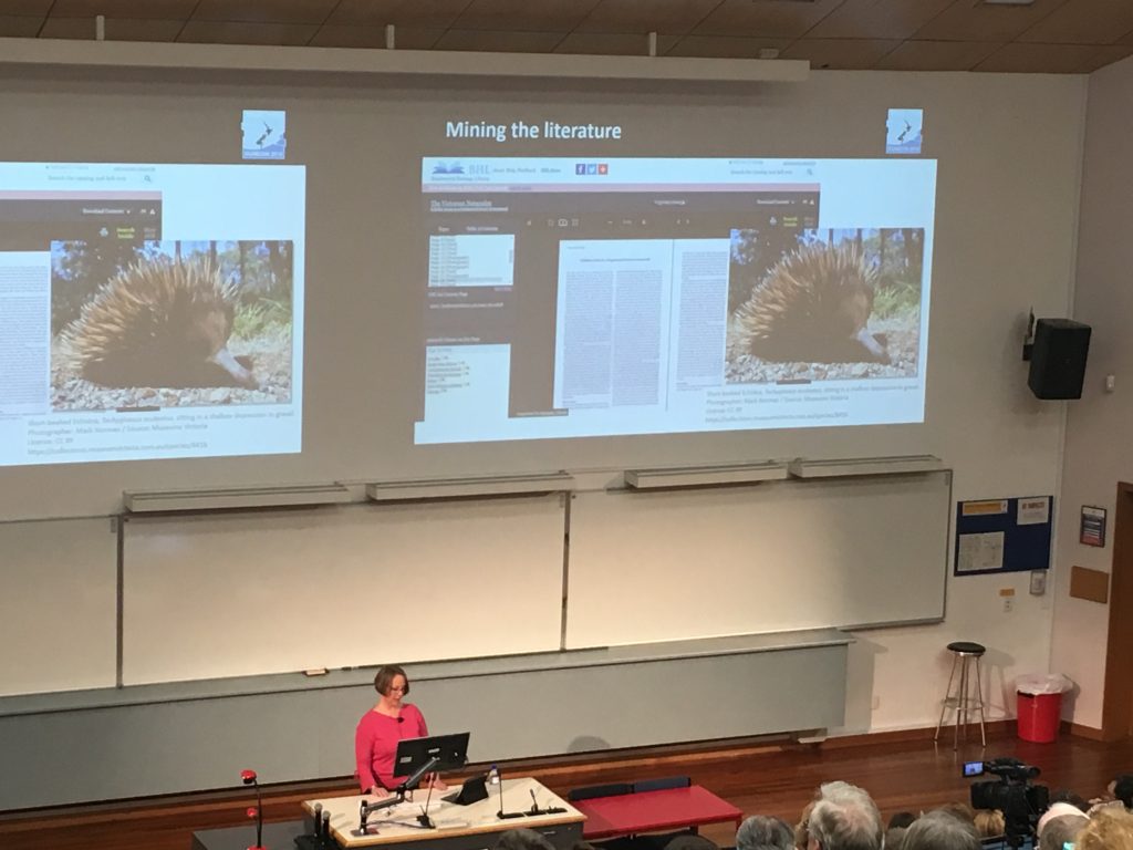 Dr. Elycia Wallis delivering a keynote address (with a highlight of BHL!) as part of the joint SPNHC/TDWG Conference.