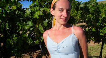 woman standing in front of a tree