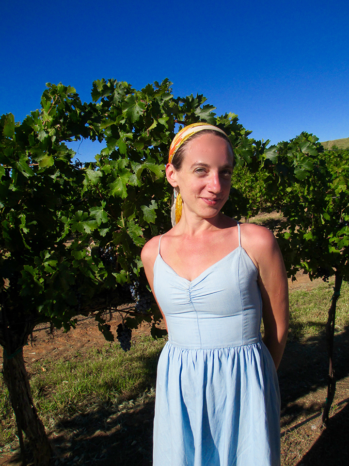 woman standing in front of a tree