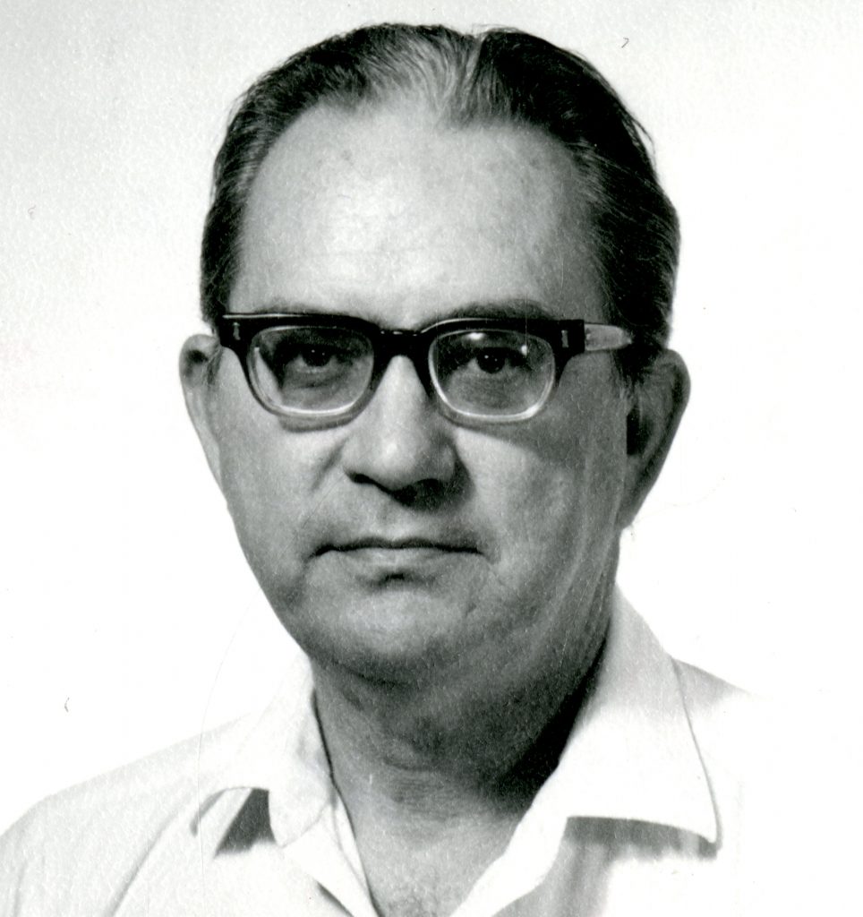 black and white image of a man in glasses, Dr. Peters