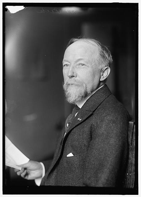 Black and white photograph of an elderly man
