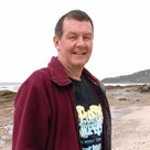 Photograph of a man on a beach