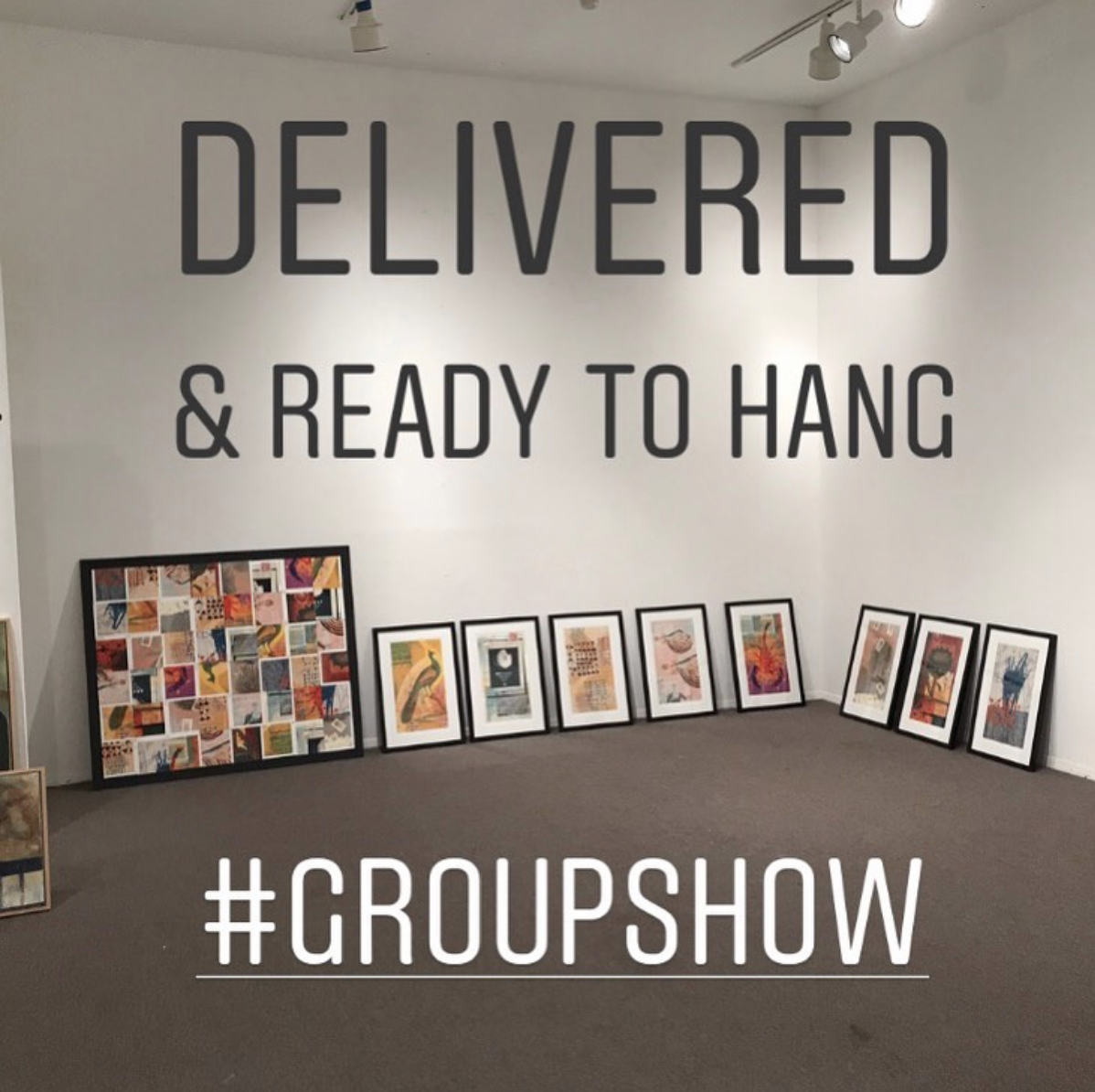framed artworks on the ground with text "delivered and ready to hang".