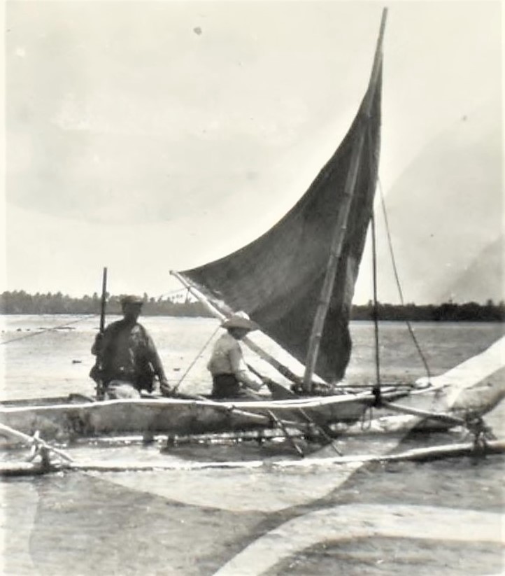Two people in a canoe.