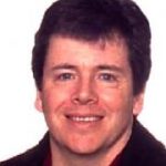 head shot of a man with brown hair.