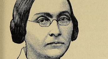 Black and white portrait of a person wearing glasses.