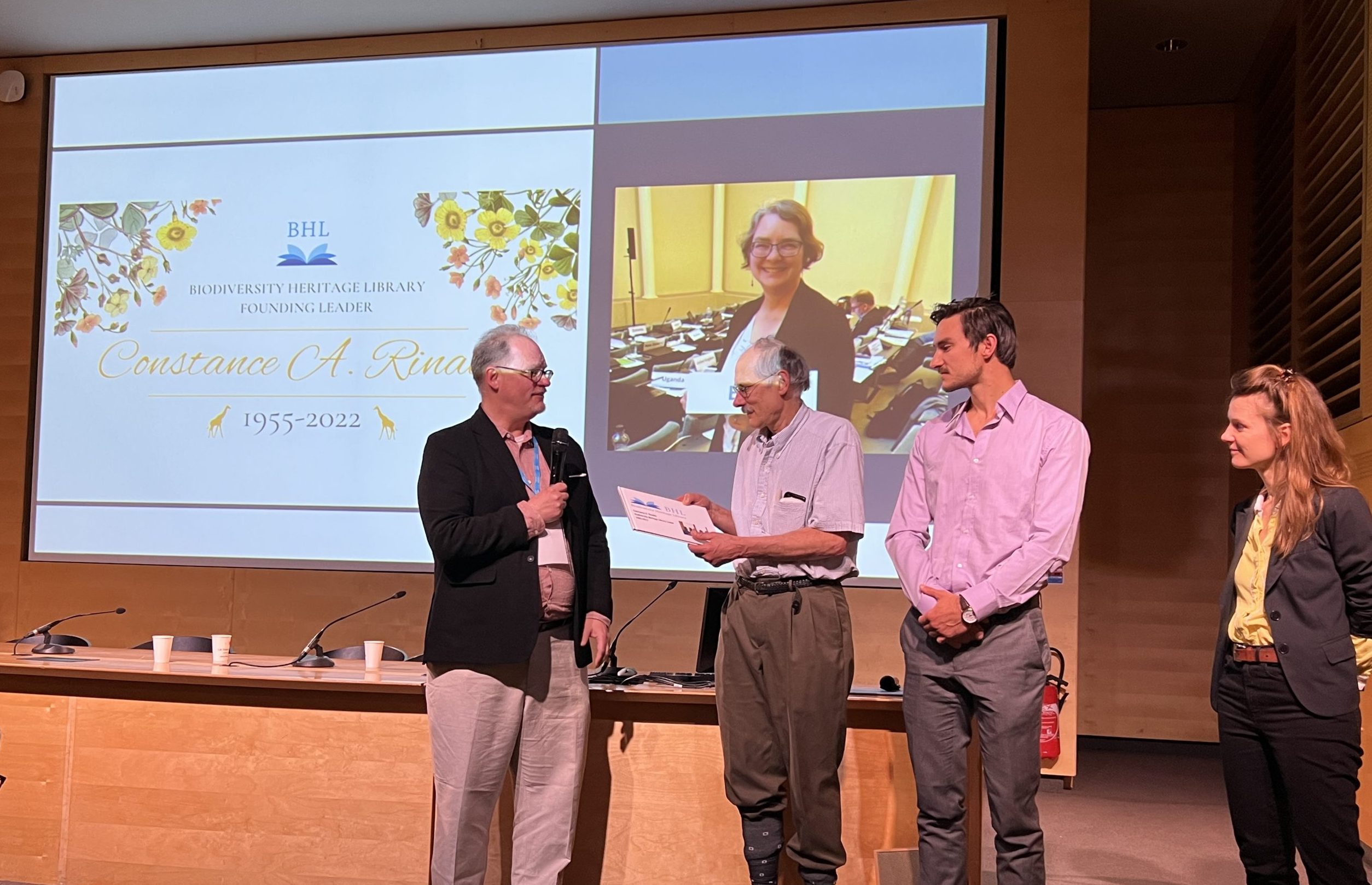 Martin Kalfatovic and the family of Constance Rinaldo on stage