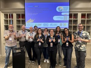 Photograph of a group of people that presented on Wikimedia and biodiversity at Living Data 2025.