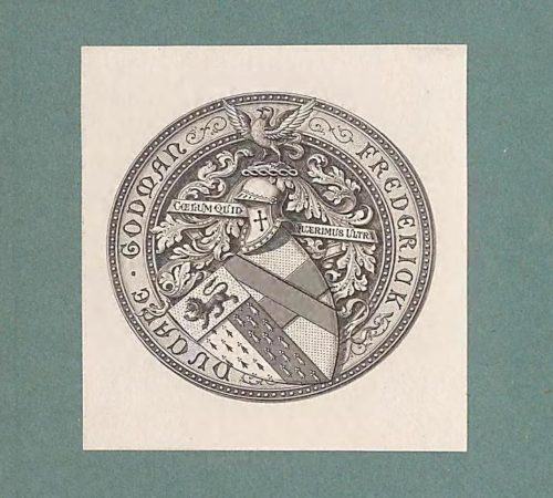 Bookplate of Frederick DuCane Godman featuring a heraldic crest with shield, motto, and decorative border on a green background.