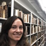 Portrait of Briana in a library